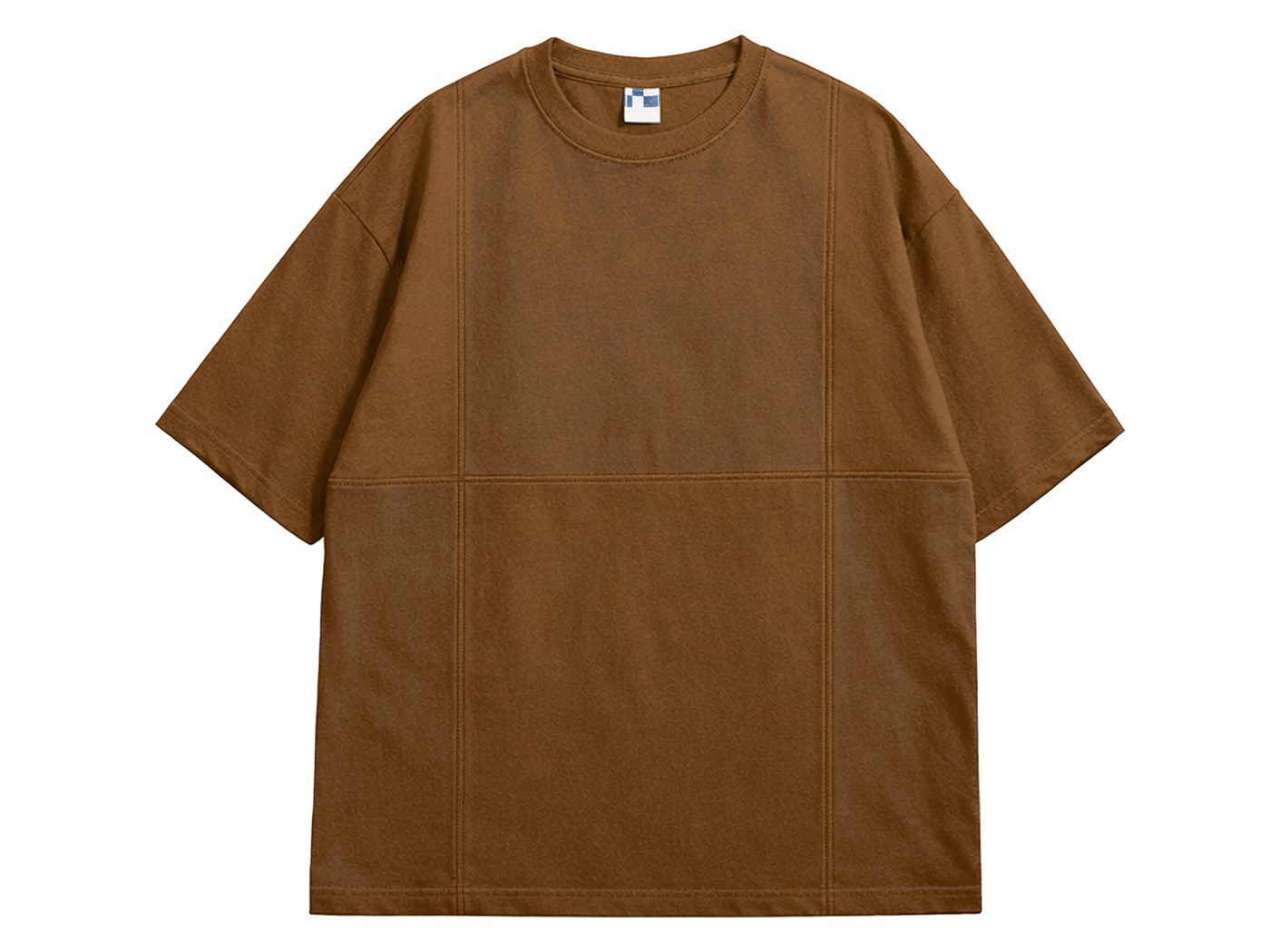Flat-lay of an oversized brown T-shirt with visible seams splitting the body into a grid.