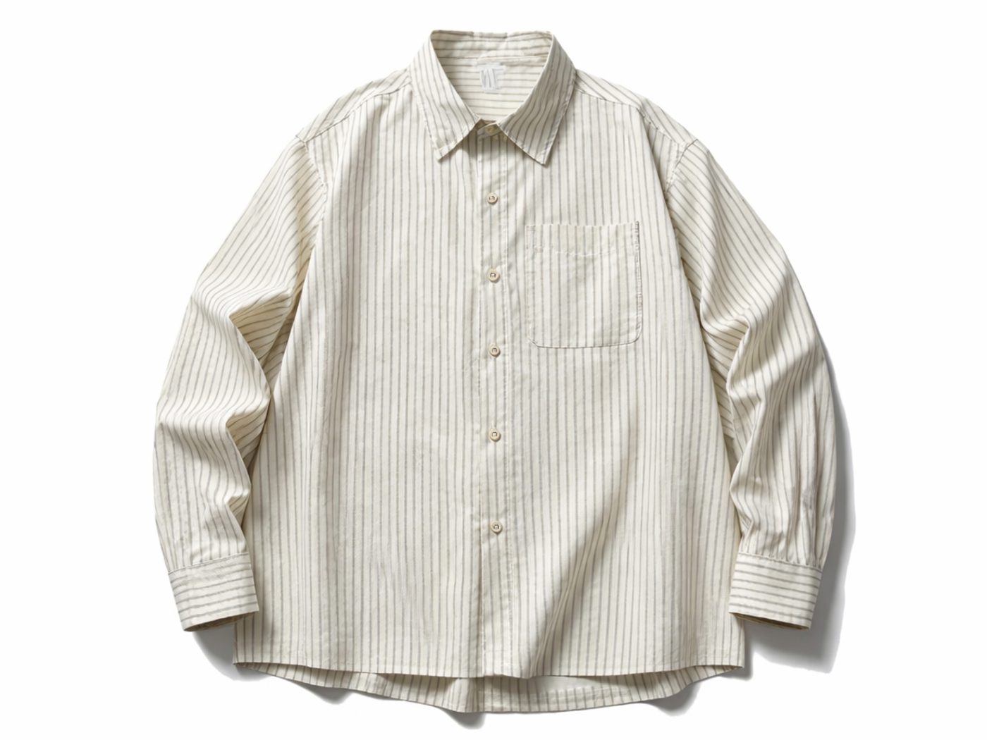 Cream striped shirt, flat lay.